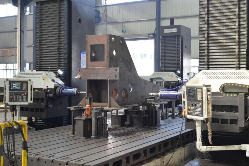 Structural workpiece positioned for machining in the company profile