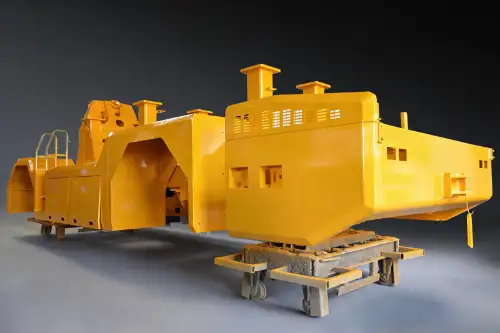 Large yellow railway multifunction service vehicle body fabricated as a project-specific welded structure
