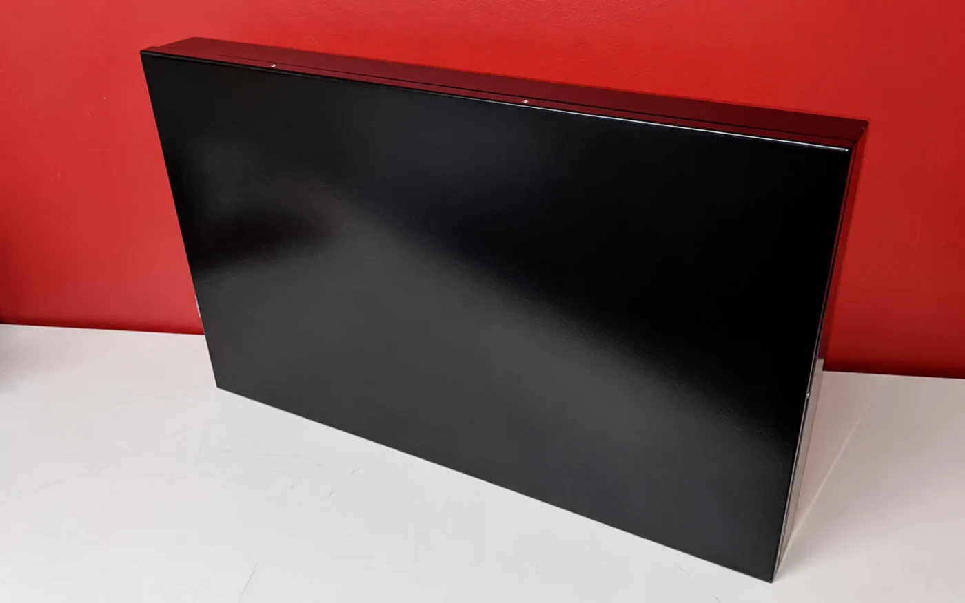 Unbranded black fabricated metal case with a fitted top cover