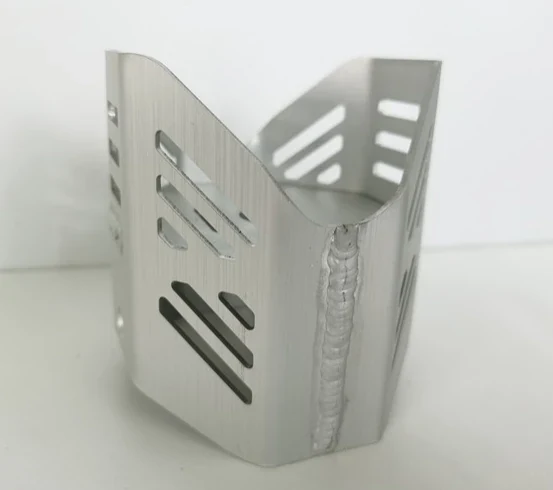 Representative welded components with machined interfaces configuration for custom component manufacture